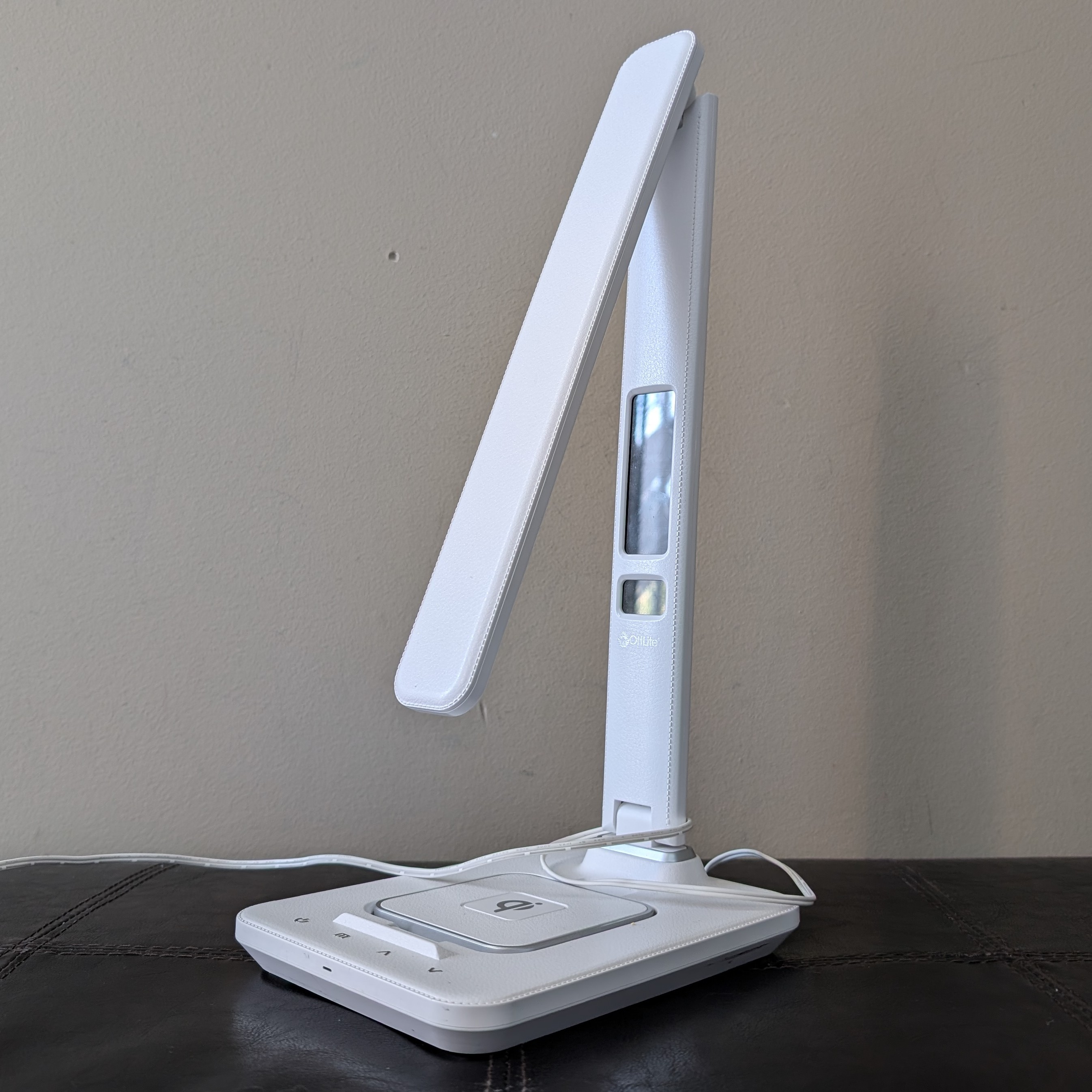Lamp.<br>
                It has a digital clock at the stem and a charger at its base.
