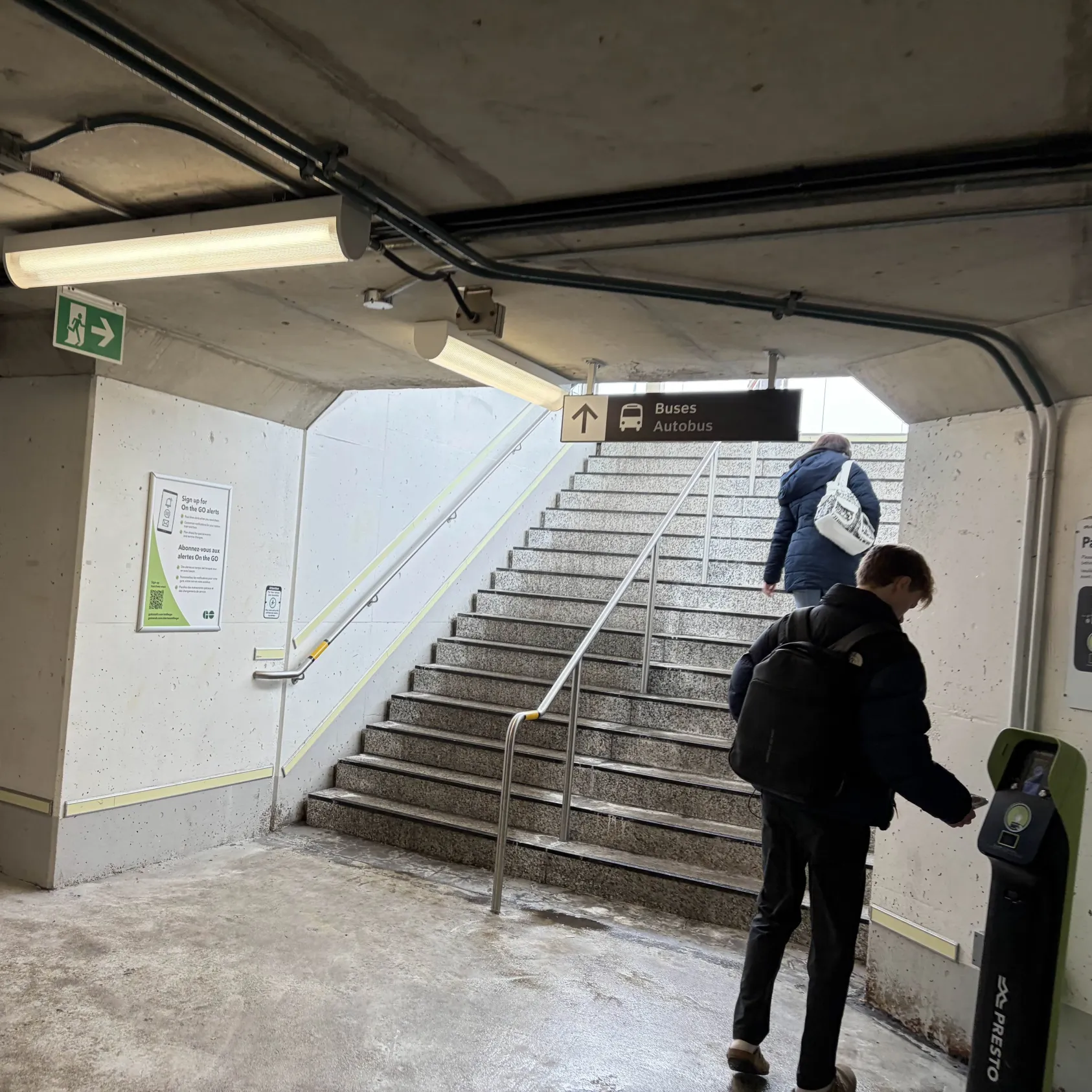 GO station overhead speakers declaring location while exiting or entering the train.