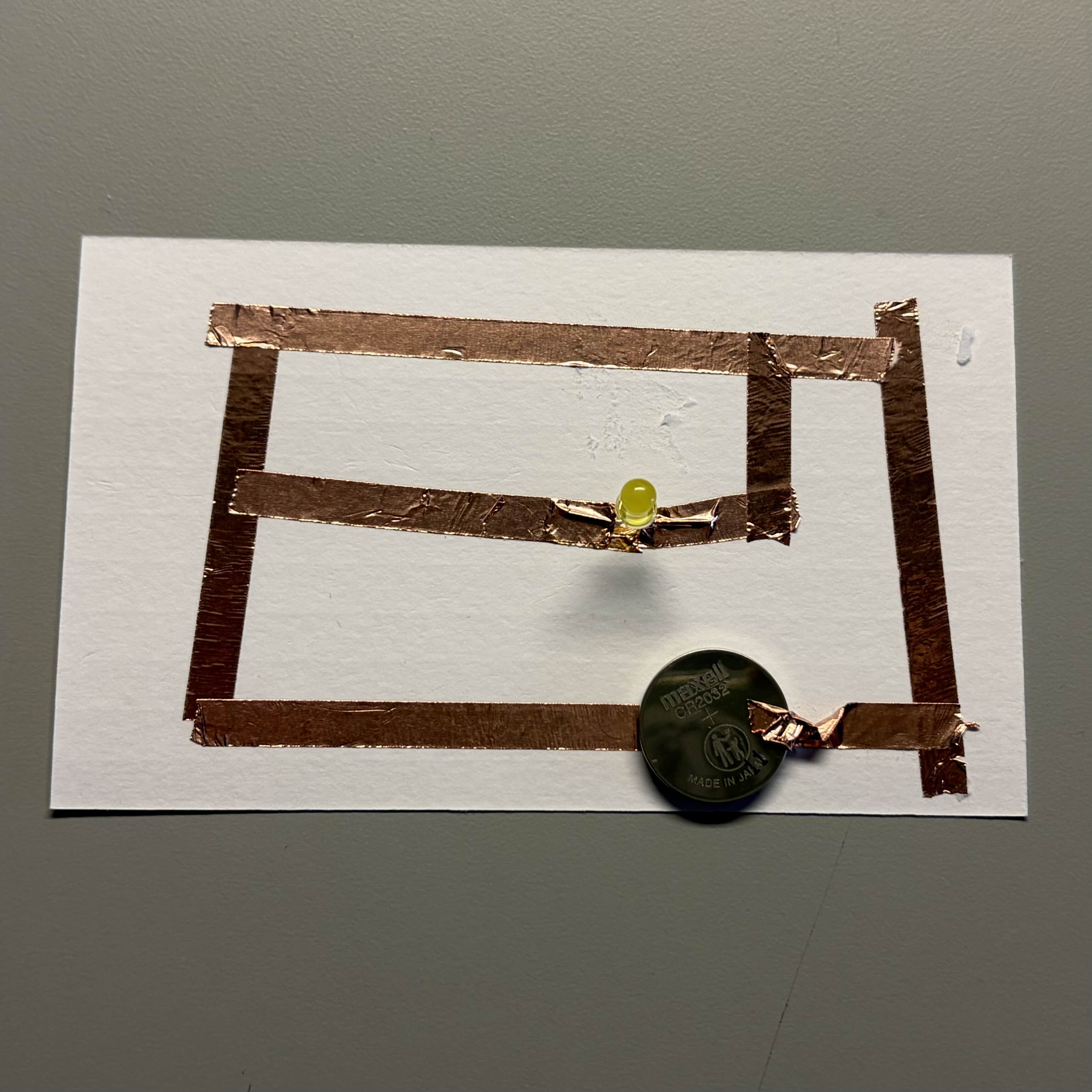 Experimenting with this circuit pattern. It turns out that having tape over ripped paper adds resistance