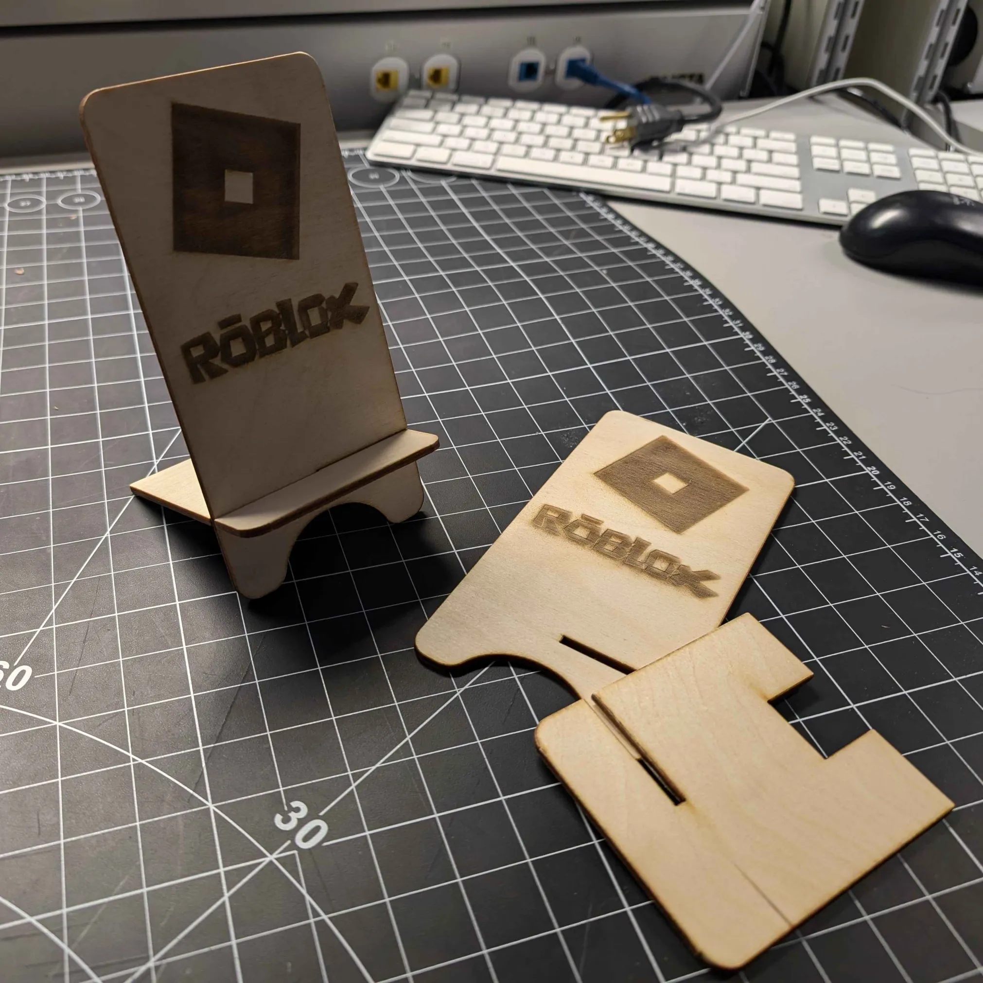 My Roblox phone stand finished from the laser cutting lab.